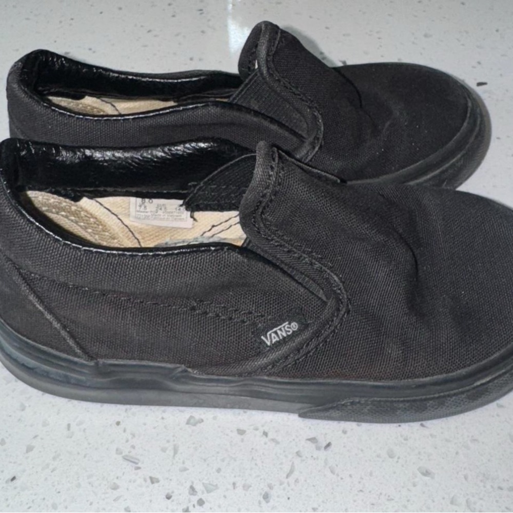 Vans Black Leather Accent Slip-Ons